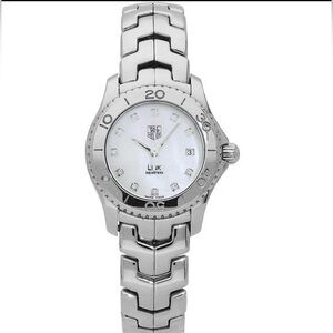 TAG Heuer, waterproof 200ft, Mother of Pearl, Diamond hour markers.